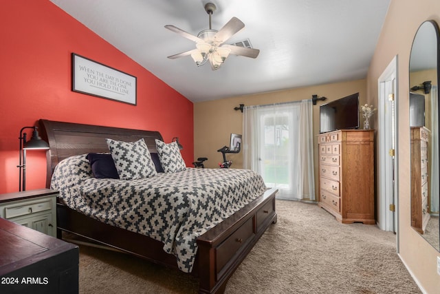 carpeted bedroom featuring ceiling fan, lofted ceiling, and access to outside