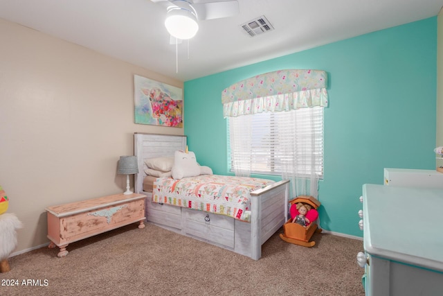 carpeted bedroom with ceiling fan