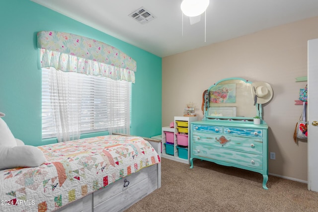 carpeted bedroom with ceiling fan