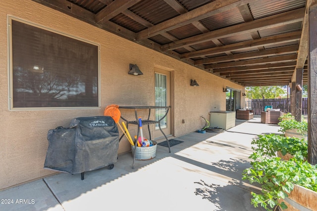 view of patio with a grill