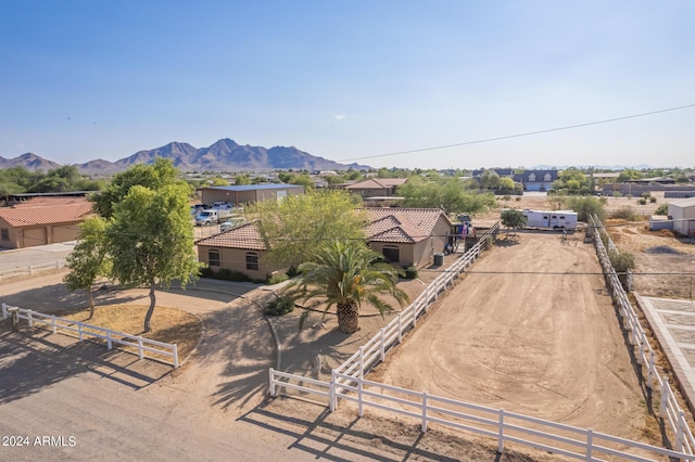 birds eye view of property featuring a mountain view