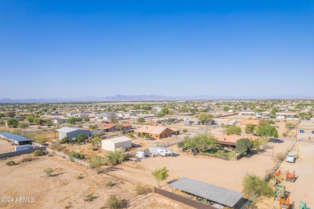 birds eye view of property featuring a mountain view