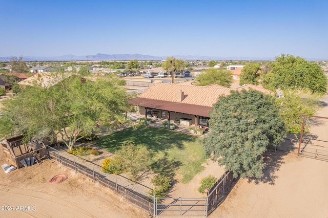 birds eye view of property featuring a mountain view