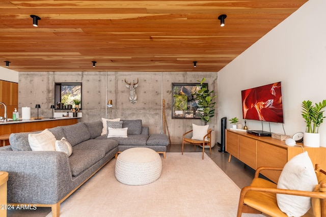 living room with wood ceiling