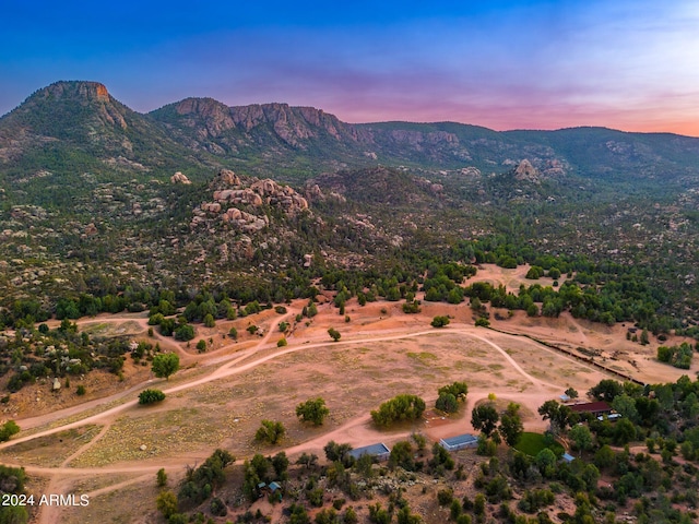 aerial view at dusk with a mountain view