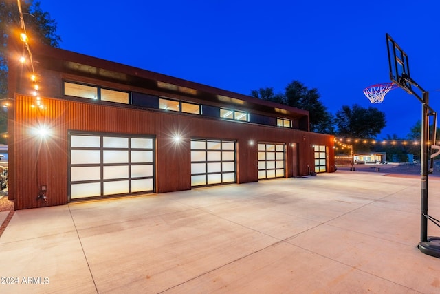 view of garage at night