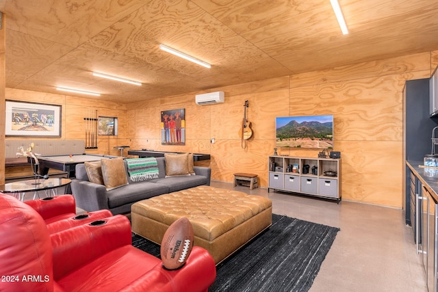 living room with a wall unit AC, concrete floors, and wooden ceiling