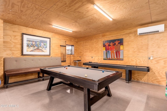 recreation room featuring a wall unit AC, wooden ceiling, and concrete floors