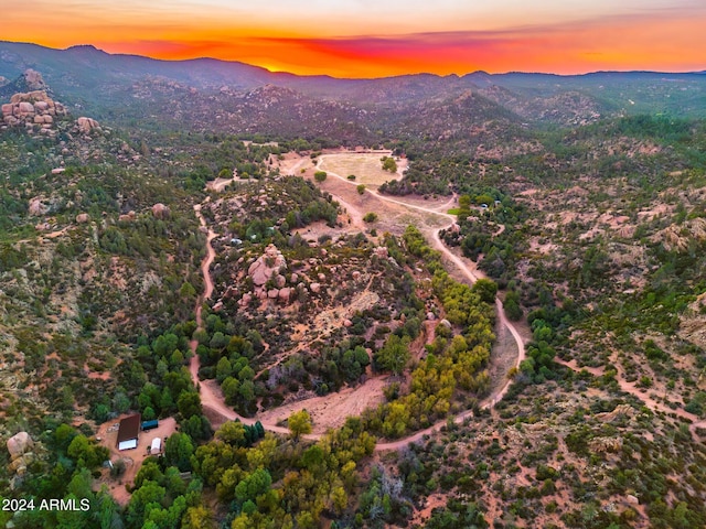 aerial view at dusk with a mountain view