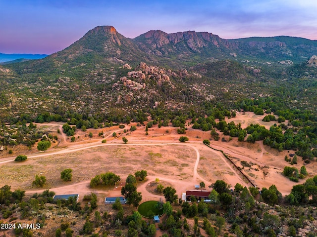 aerial view at dusk with a mountain view