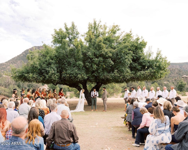 surrounding community with a mountain view