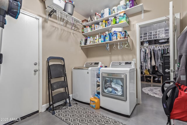laundry room featuring laundry area and washing machine and clothes dryer