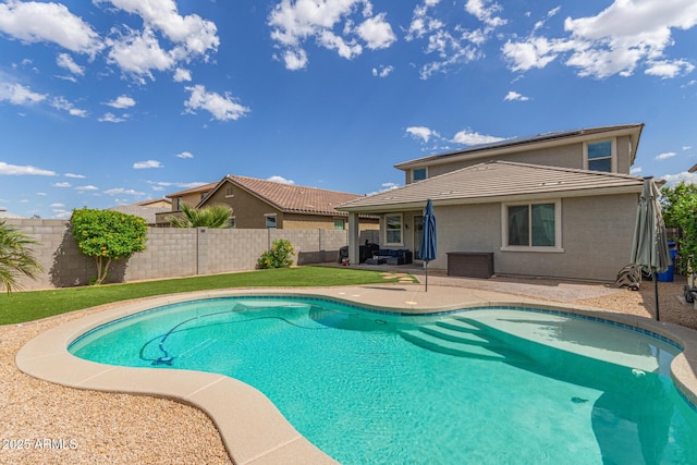 view of pool with a fenced in pool, a fenced backyard, and a patio area
