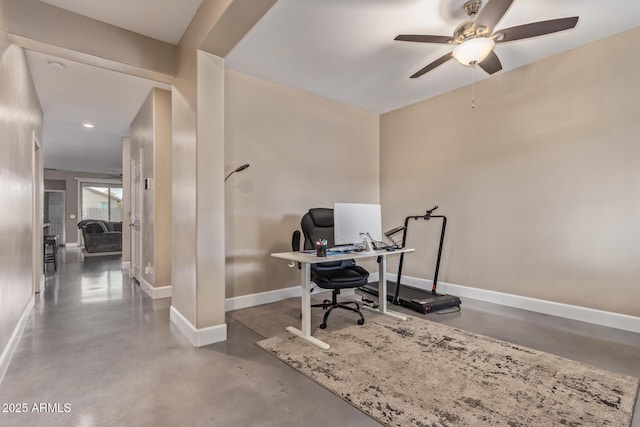 home office featuring concrete flooring, baseboards, recessed lighting, and ceiling fan