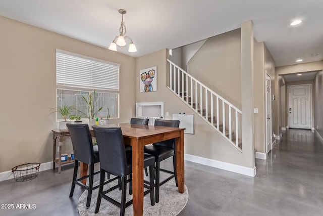 dining space featuring stairs, recessed lighting, baseboards, and finished concrete flooring