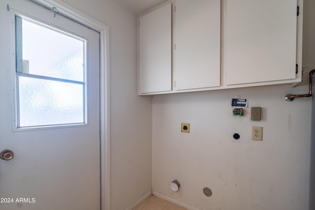 clothes washing area featuring electric dryer hookup and gas dryer hookup