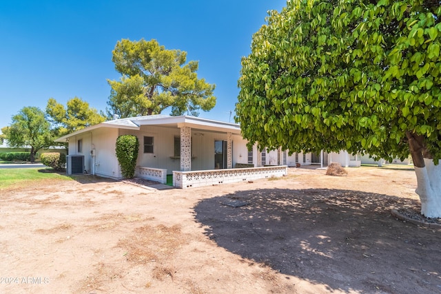 view of front of home with cooling unit