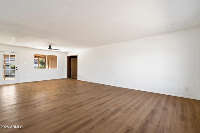 unfurnished room featuring hardwood / wood-style flooring and ceiling fan