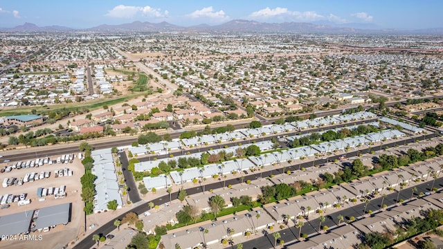 birds eye view of property featuring a mountain view