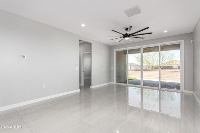 empty room with a ceiling fan, recessed lighting, baseboards, and visible vents