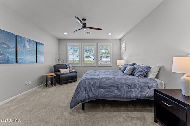 carpeted bedroom with ceiling fan