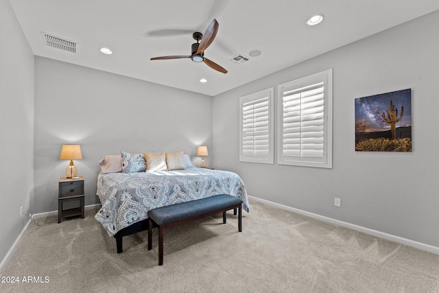 carpeted bedroom with ceiling fan