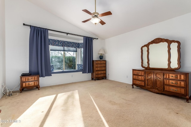 carpeted bedroom featuring vaulted ceiling and ceiling fan