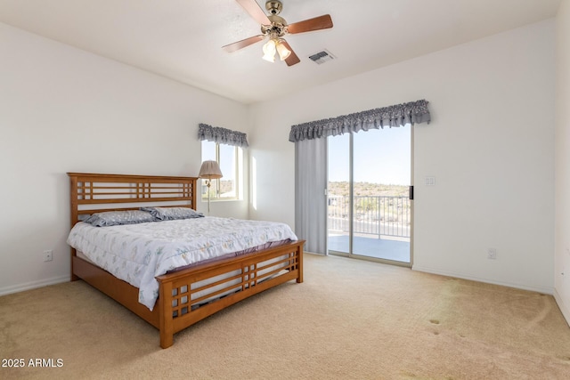 carpeted bedroom featuring access to outside and ceiling fan