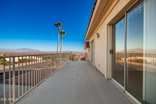 balcony featuring a mountain view