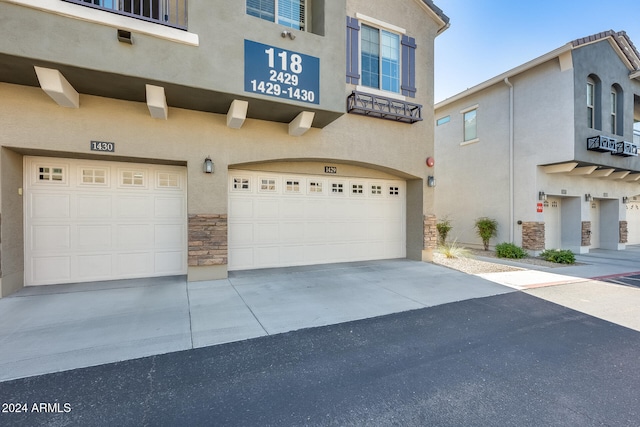 view of front of property with a garage