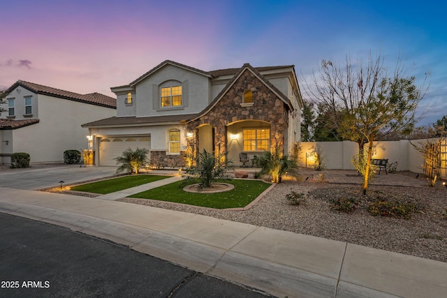 view of front of property with a garage