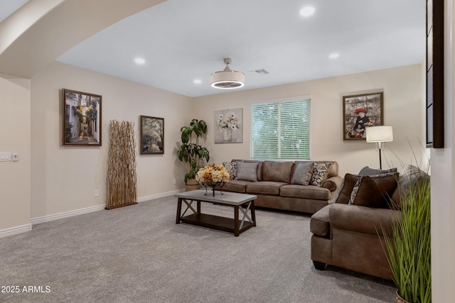 living room with light colored carpet