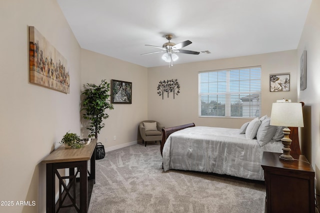 bedroom featuring ceiling fan and carpet floors