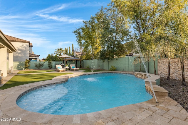 view of pool with a gazebo, a patio area, and pool water feature