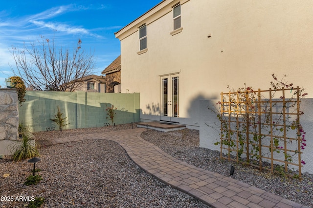 view of yard with a patio area and french doors