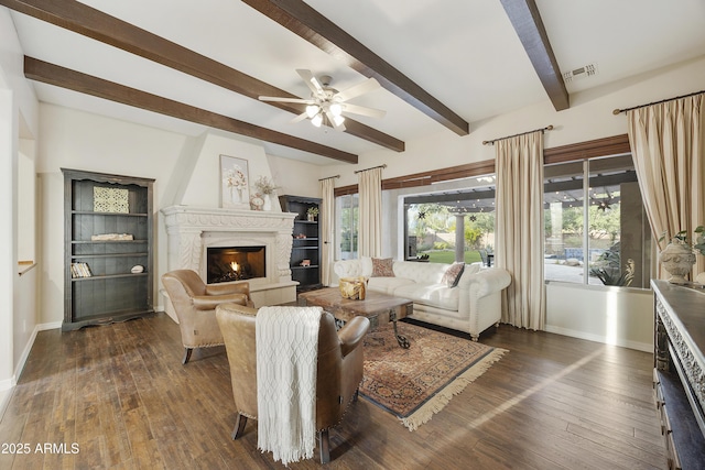 2727 S Balboa Dr, Gilbert, AZ 85295 - living area with a high end fireplace, baseboards, ceiling fan, beam ceiling, and dark wood-style floors