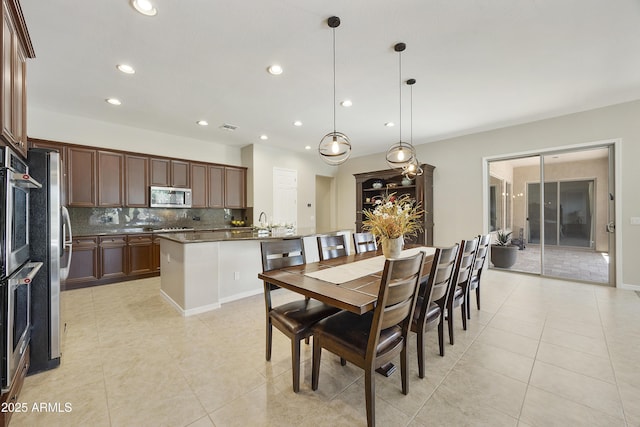 2727 S Balboa Dr, Gilbert, AZ 85295 - dining space featuring light tile patterned flooring and recessed lighting