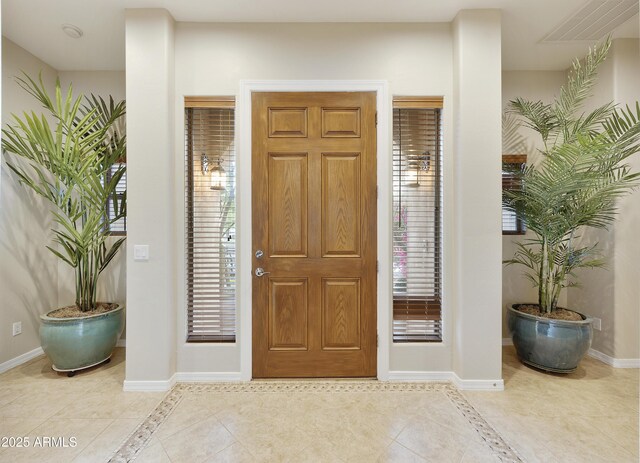 2727 S Balboa Dr, Gilbert, AZ 85295 - foyer entrance with baseboards, inlaid floor details, and light tile patterned flooring