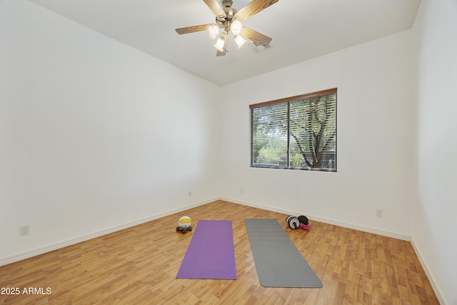 2727 S Balboa Dr, Gilbert, AZ 85295 - workout area with light wood finished floors, a ceiling fan, and baseboards