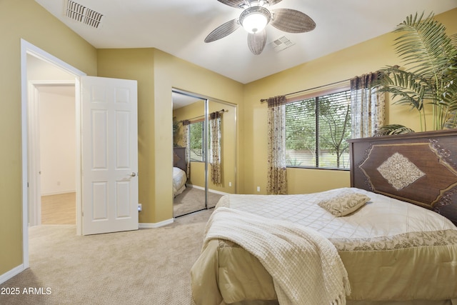 2727 S Balboa Dr, Gilbert, AZ 85295 - bedroom with light carpet, a closet, ceiling fan, and baseboards