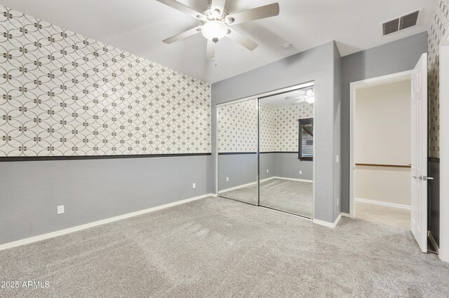 2727 S Balboa Dr, Gilbert, AZ 85295 - unfurnished bedroom featuring carpet flooring, baseboards, a ceiling fan, and a closet