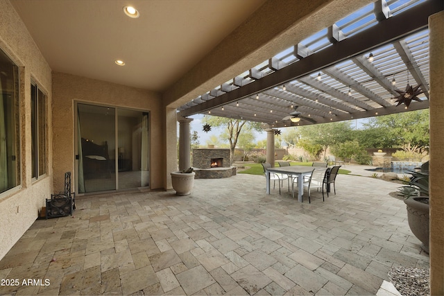 2727 S Balboa Dr, Gilbert, AZ 85295 - view of patio featuring a pergola, a ceiling fan, outdoor dining area, an outdoor stone fireplace, and fence