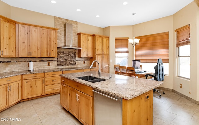 kitchen featuring backsplash, an inviting chandelier, a sink, wall chimney exhaust hood, and black electric cooktop