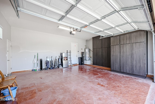 garage with a garage door opener and water heater