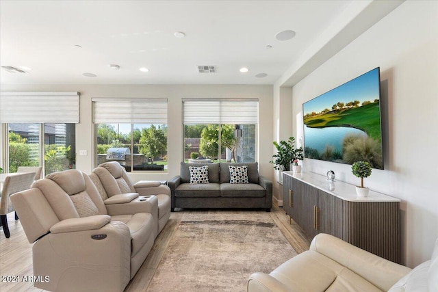 living room with light hardwood / wood-style floors