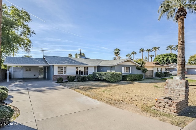 ranch-style house featuring a carport