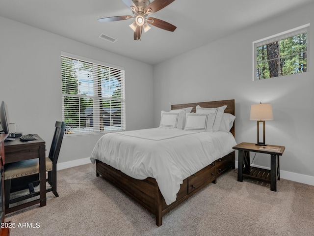 956 S Torrey Pines Dr, Williams, AZ 86046 - bedroom with light carpet, a desk, and ceiling fan