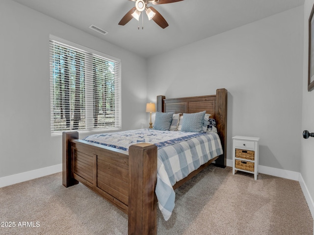 956 S Torrey Pines Dr, Williams, AZ 86046 - bedroom with light carpet and a ceiling fan