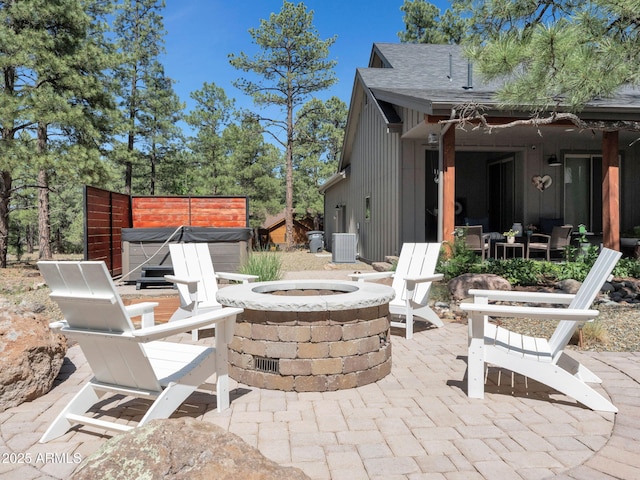 956 S Torrey Pines Dr, Williams, AZ 86046 - view of patio / terrace featuring a hot tub and an outdoor fire pit