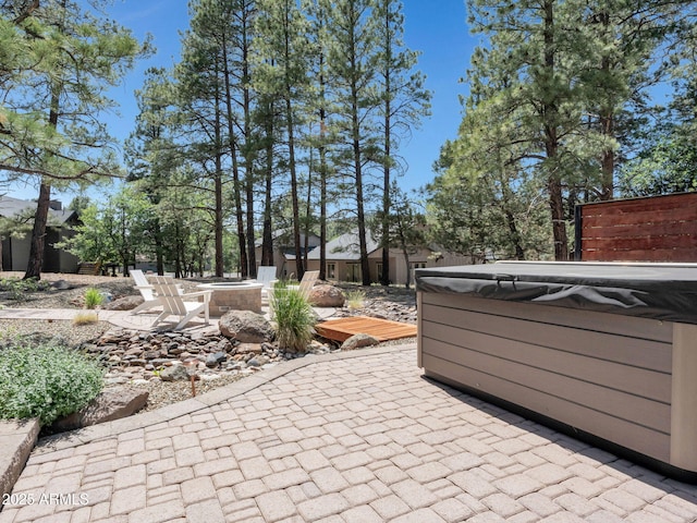 956 S Torrey Pines Dr, Williams, AZ 86046 - view of patio / terrace with a hot tub